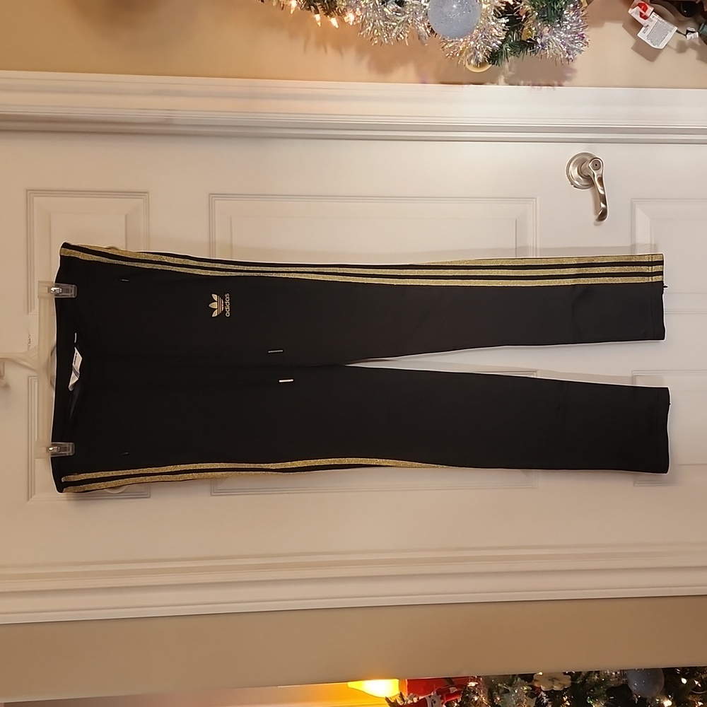 adidas Originals Black Track Pants with Gold Stripe Accents